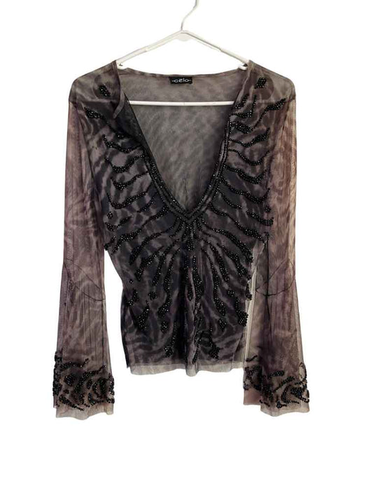 Blusa De Malla Con Pepitas Marca Celo
